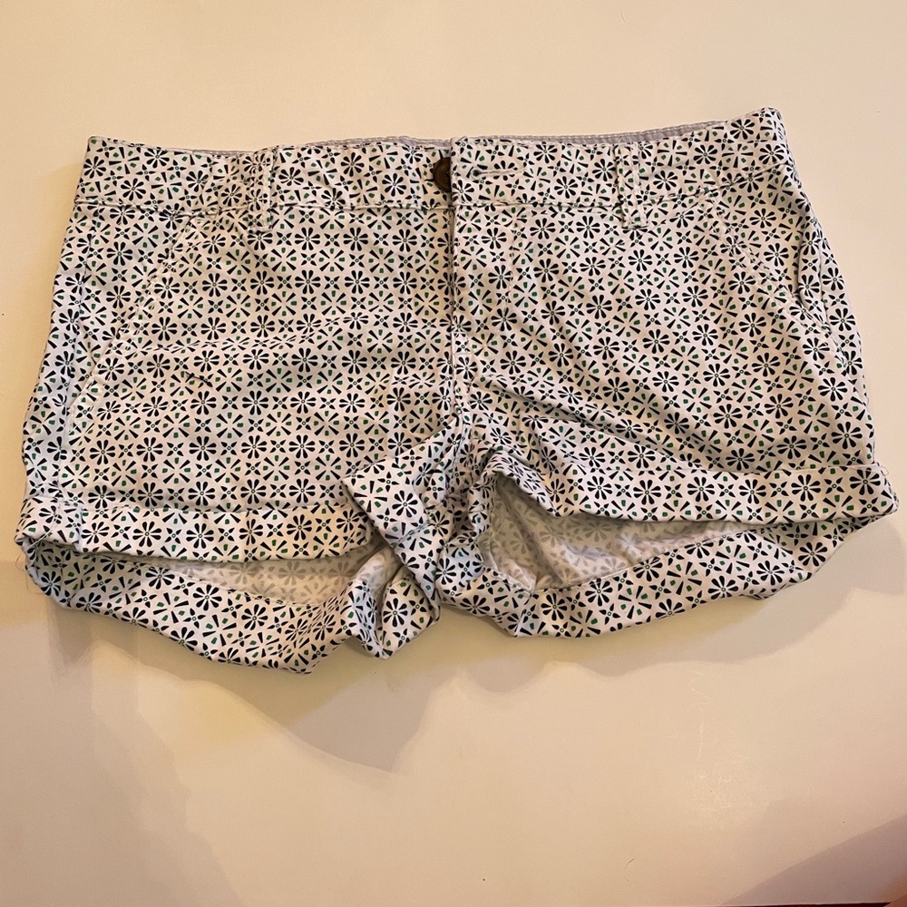 navy and green designed shorts